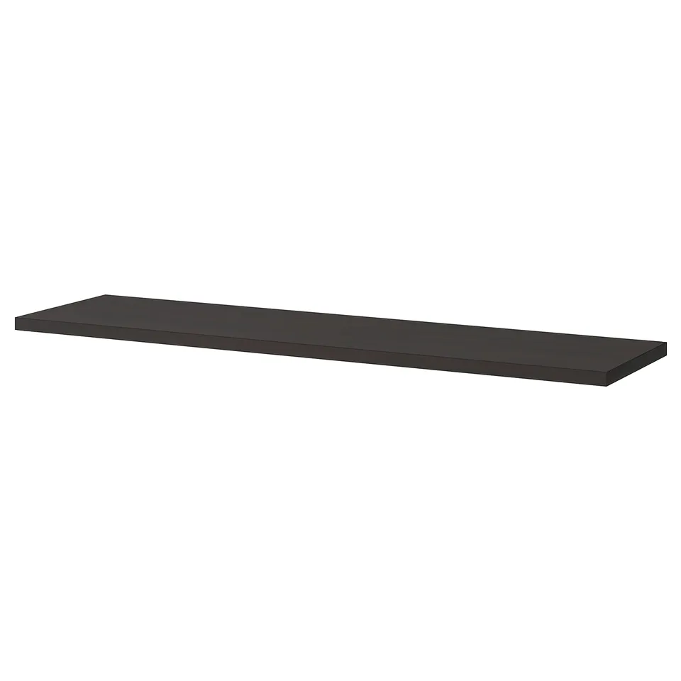 A dark brown-black BERGSHULT wall shelf, rectangular in shape with one bevelled edge, made from particleboard and plastic edging.