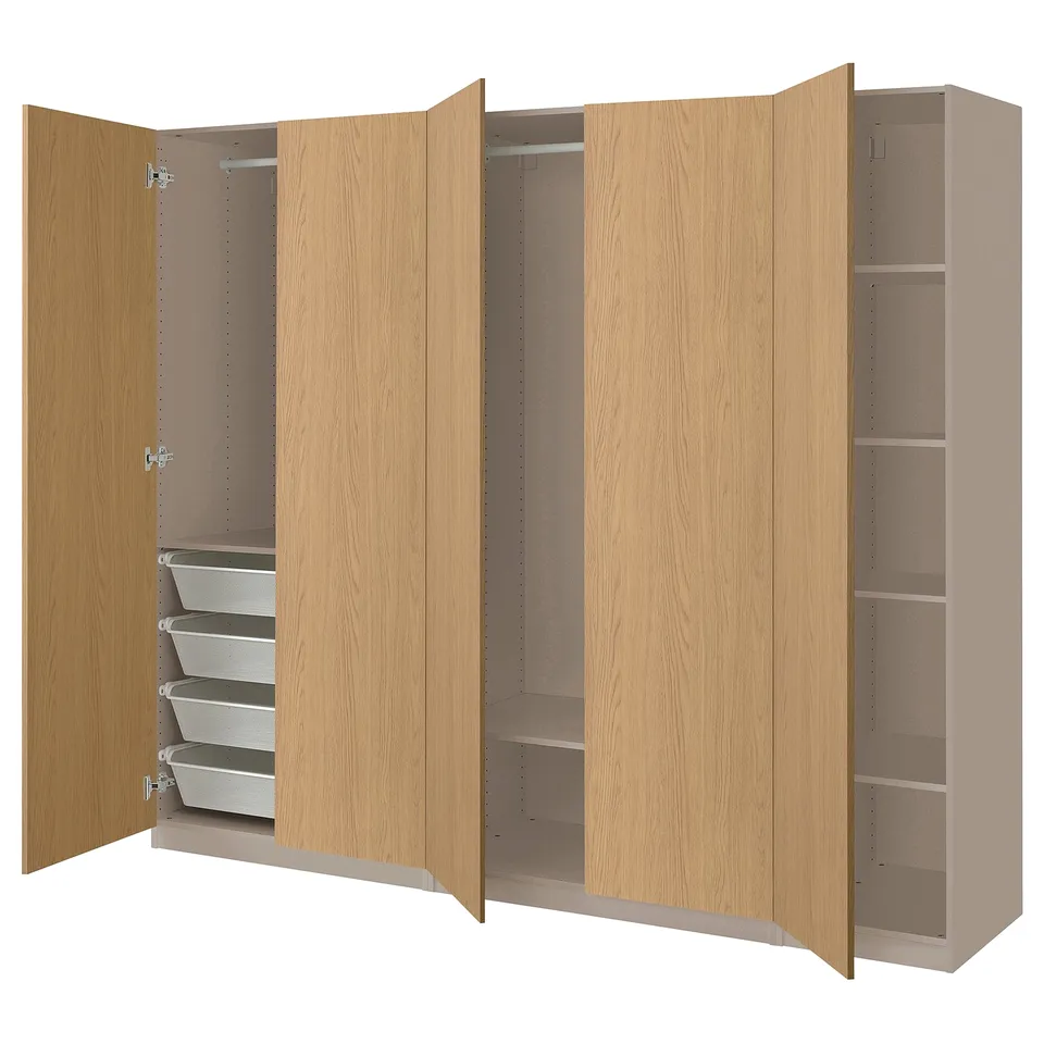 Light wooden PAX wardrobe with open doors, shelves, and mesh basket drawers.