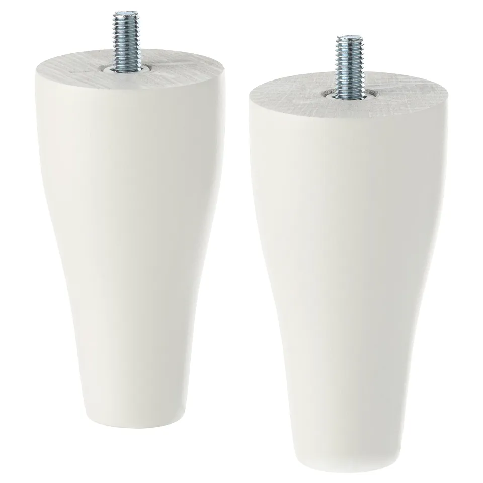 Two white wooden furniture legs with screws, conical shape.