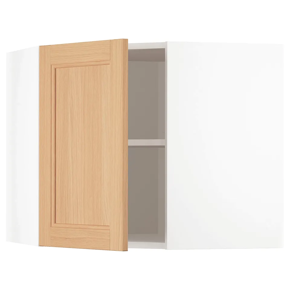 A white METOD kitchen cabinet with an open wooden door revealing an adjustable shelf inside.
