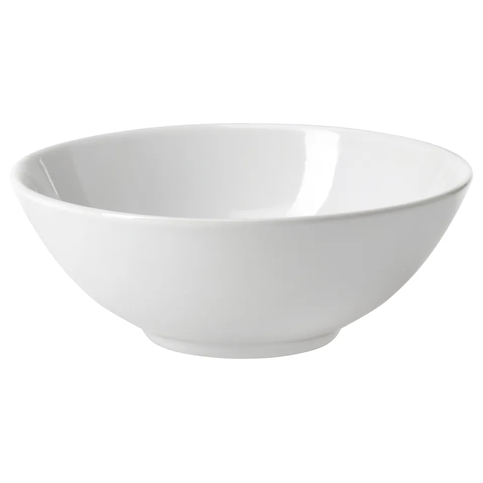 A single white GODMIDDAG dinner bowl. Made of stoneware with a sleek, simple design perfect for everyday or special occasions.