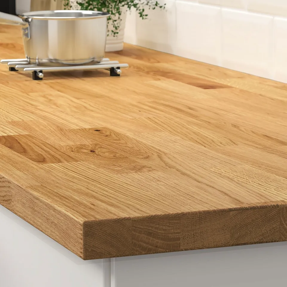 Wood countertop with natural grain and smooth finish.
