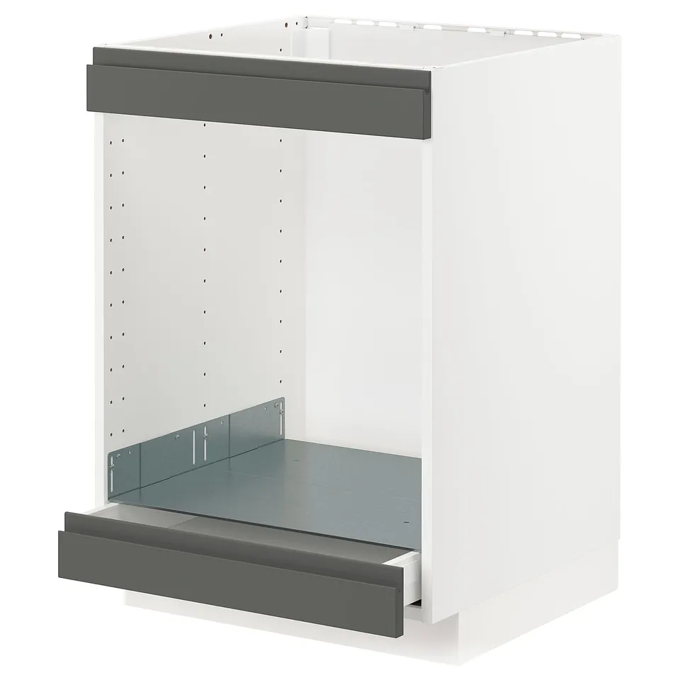 An ikea METOD kitchen cabinet with a dark grey drawer and white frame.