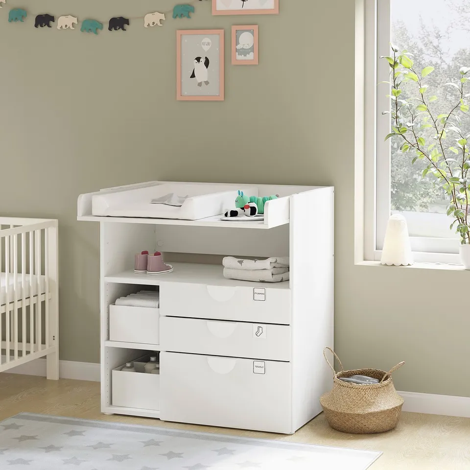 Baby changing table with drawers, white, wooden, rectangular, and modern design.