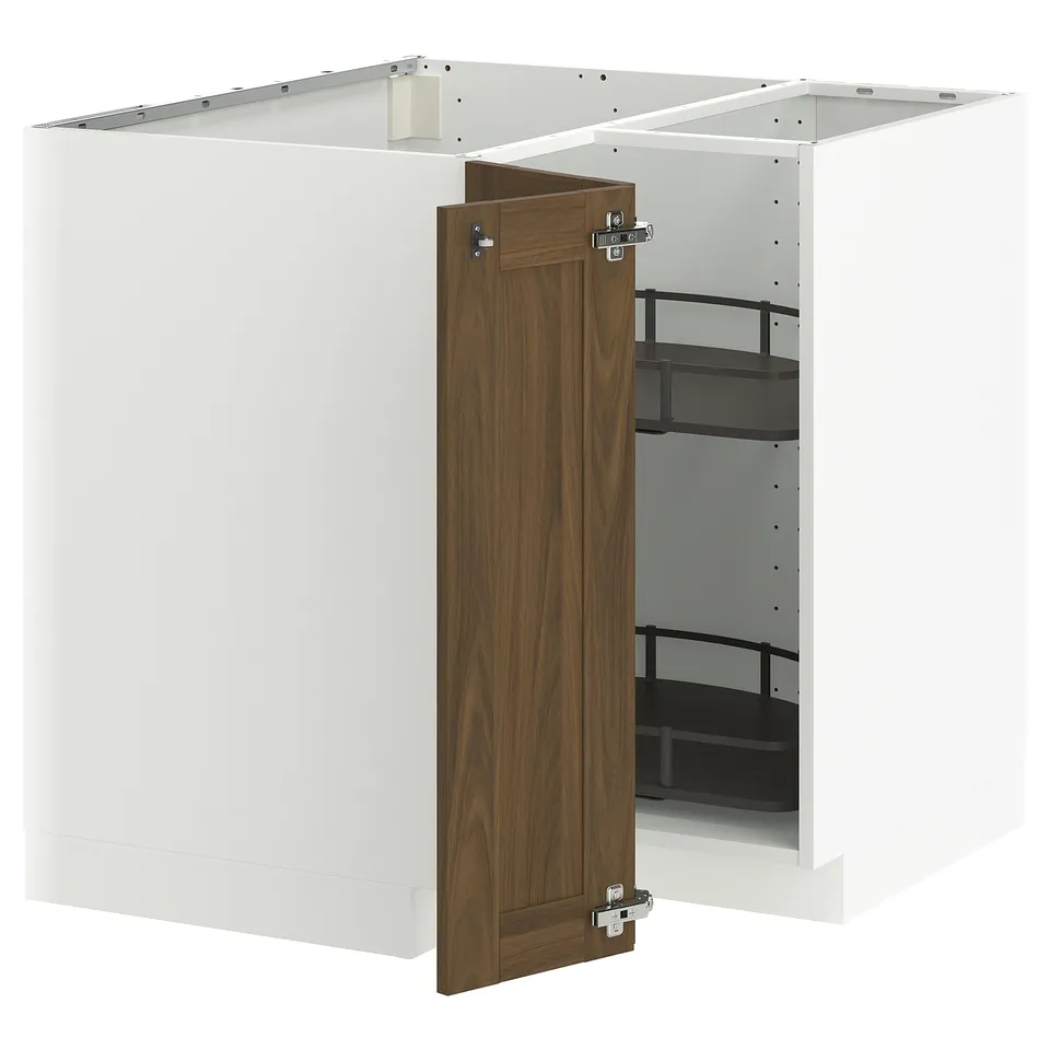 This image shows a white and walnut ikea METOD kitchen cabinet with an open door, revealing adjustable shelves.