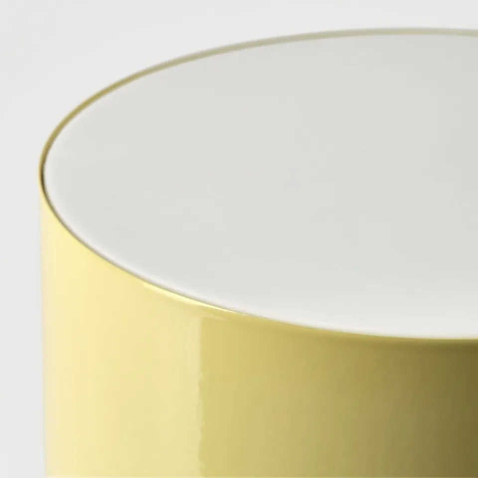 Elegant table lamp with sleek, metallic gold finish and smooth edges.