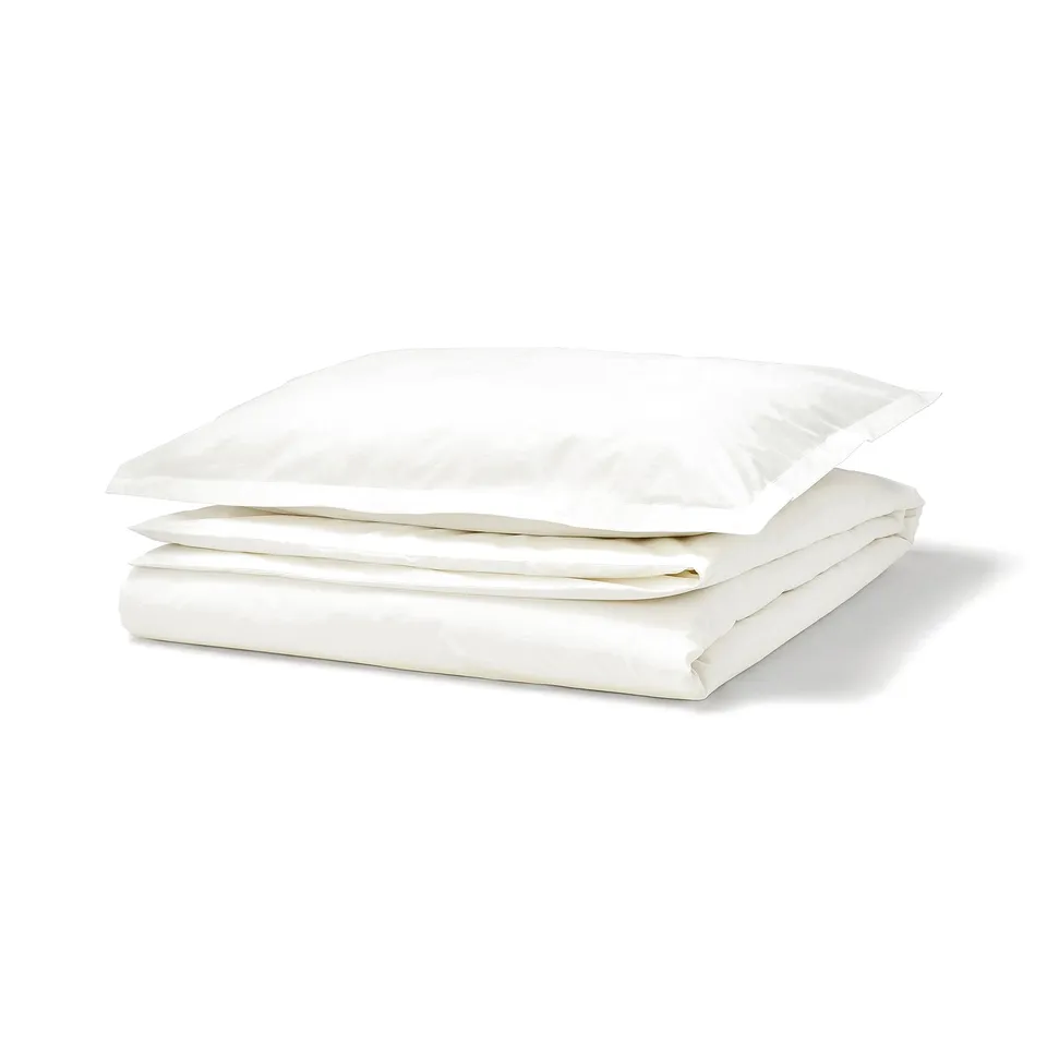 HAMPFLOCKEL, white duvet set, cotton, crisp, folded, clean design.