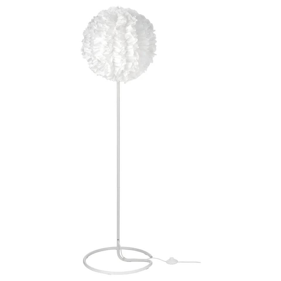 A white VINDKAST floor lamp with a cloud-like shade made of recycled polyester, providing soft mood light.
