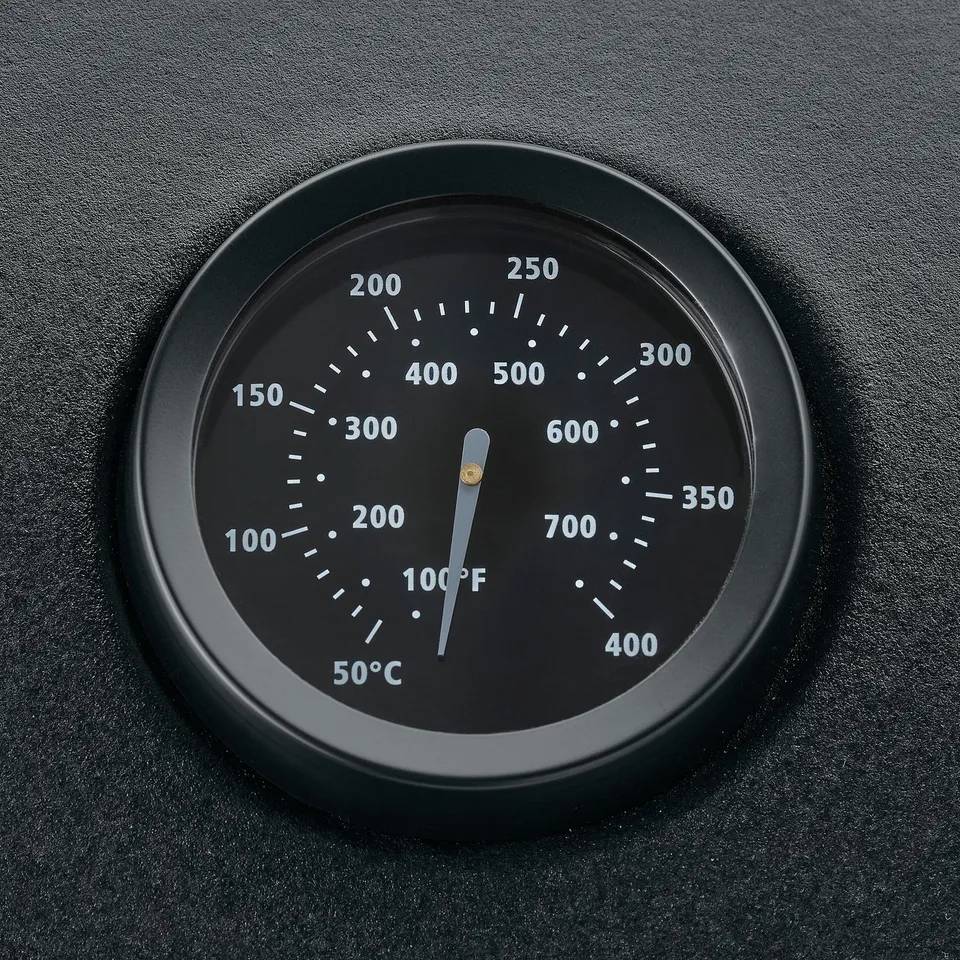 Black outdoor kitchen temperature gauge. Shows fahrenheit and celsius, ranging from 100°f to 400°f.
