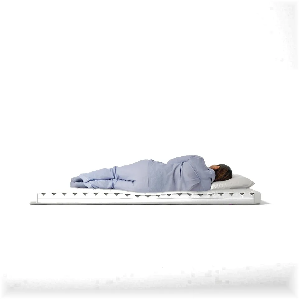 Person sleeping on light blue shirt, white pillow, and white mattress with triangular pattern on a plain white background.