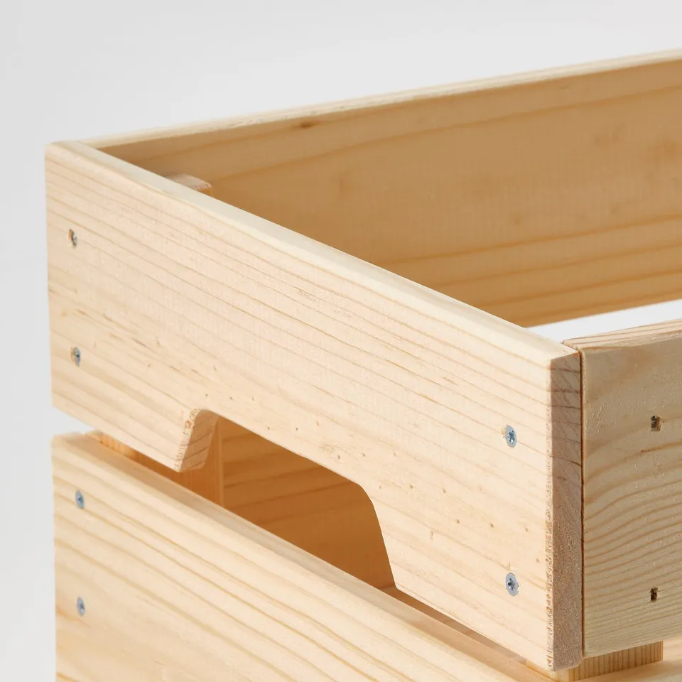 Natural wooden crate with cutout handle. Strong, sturdy design for easy carrying.