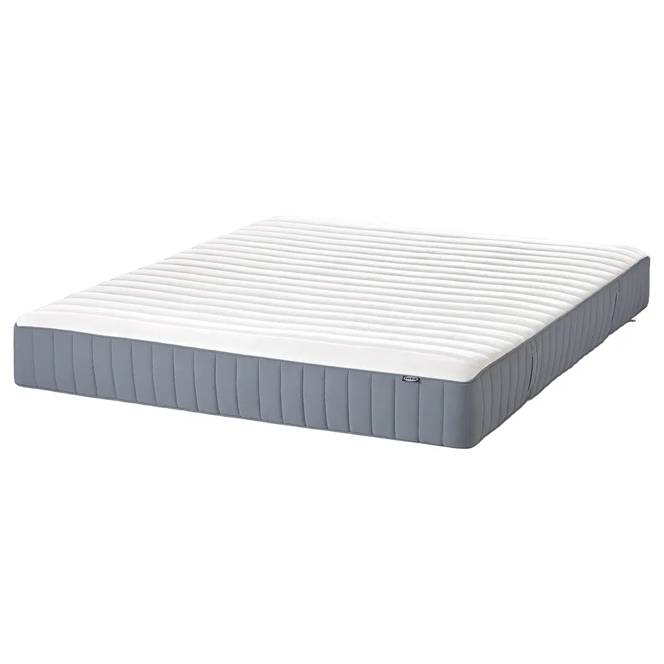 A NORDLI bed mattress in grey and white. It is rectangular with a quilted surface and a bordered edge.