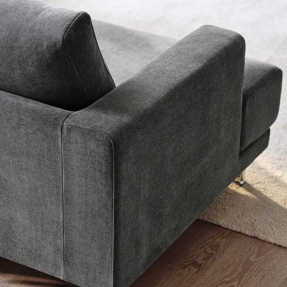 Close-up of UPPÅKRA sofas sturdy, comfortable fabric and sleek design.