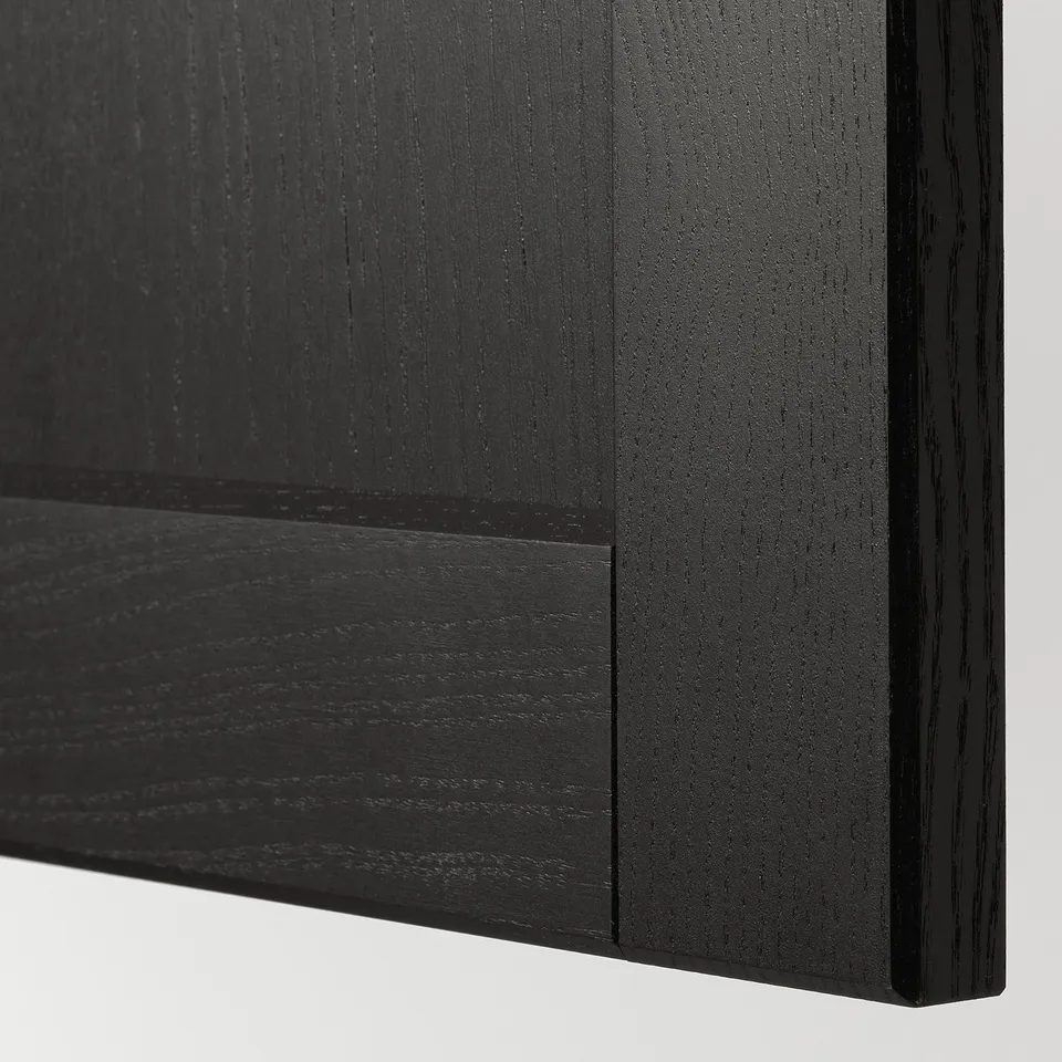 Close-up of dark wooden panel, smooth with bevelled edges, showcasing high-quality craftsmanship.