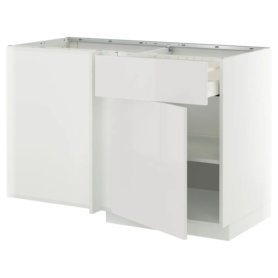 A white METOD kitchen cabinet with a modern, sleek design. It a door and adjustable shelves.