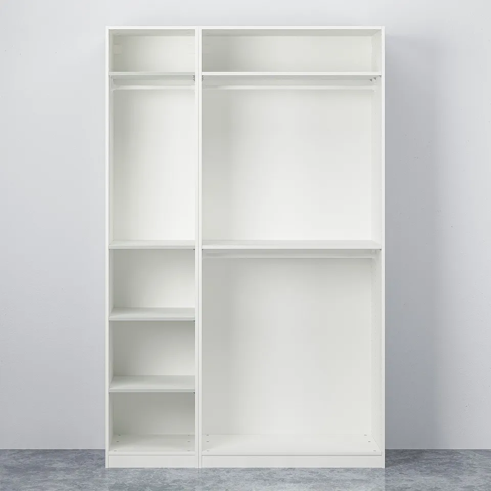Empty white PAX wardrobe against grey wall, shown with multiple shelves for storage.