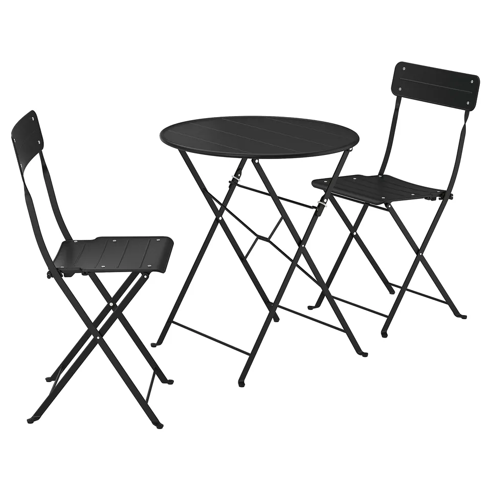 Black SUNDSÖ bistro set with table & 2 folding chairs, ideal for small spaces & easy storage.