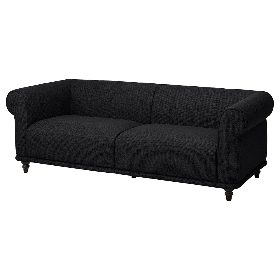 Black VISKAFORS sofa. Classic, inviting design with soft, rounded shapes and deep seats. Upholstered in fabric, supported by wooden legs.