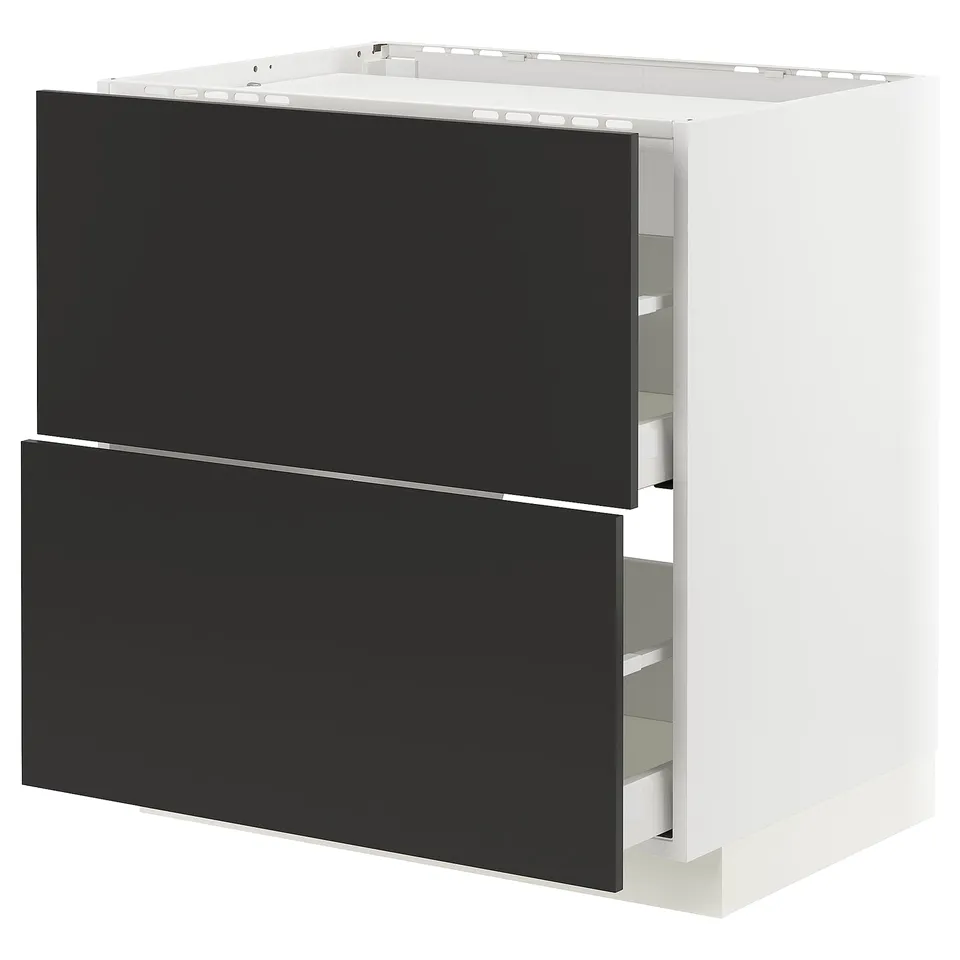Modern black kitchen cabinet with sleek drawers and white frame.