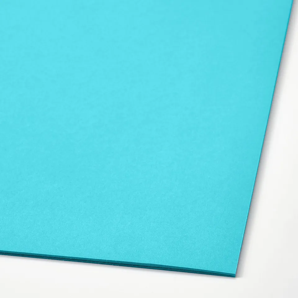 A4 turquoise construction paper, thick, smooth texture, excellent quality.