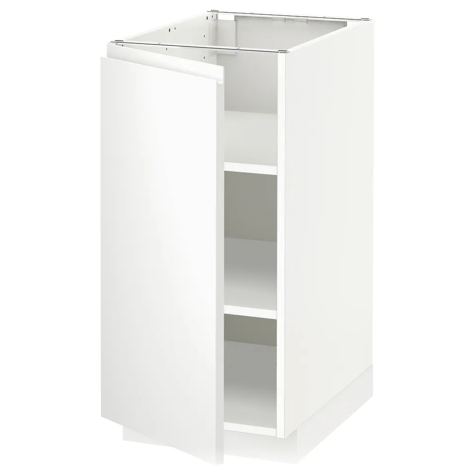 A white METOD kitchen cabinet with a single, adjustable shelf and a door with integrated handles.