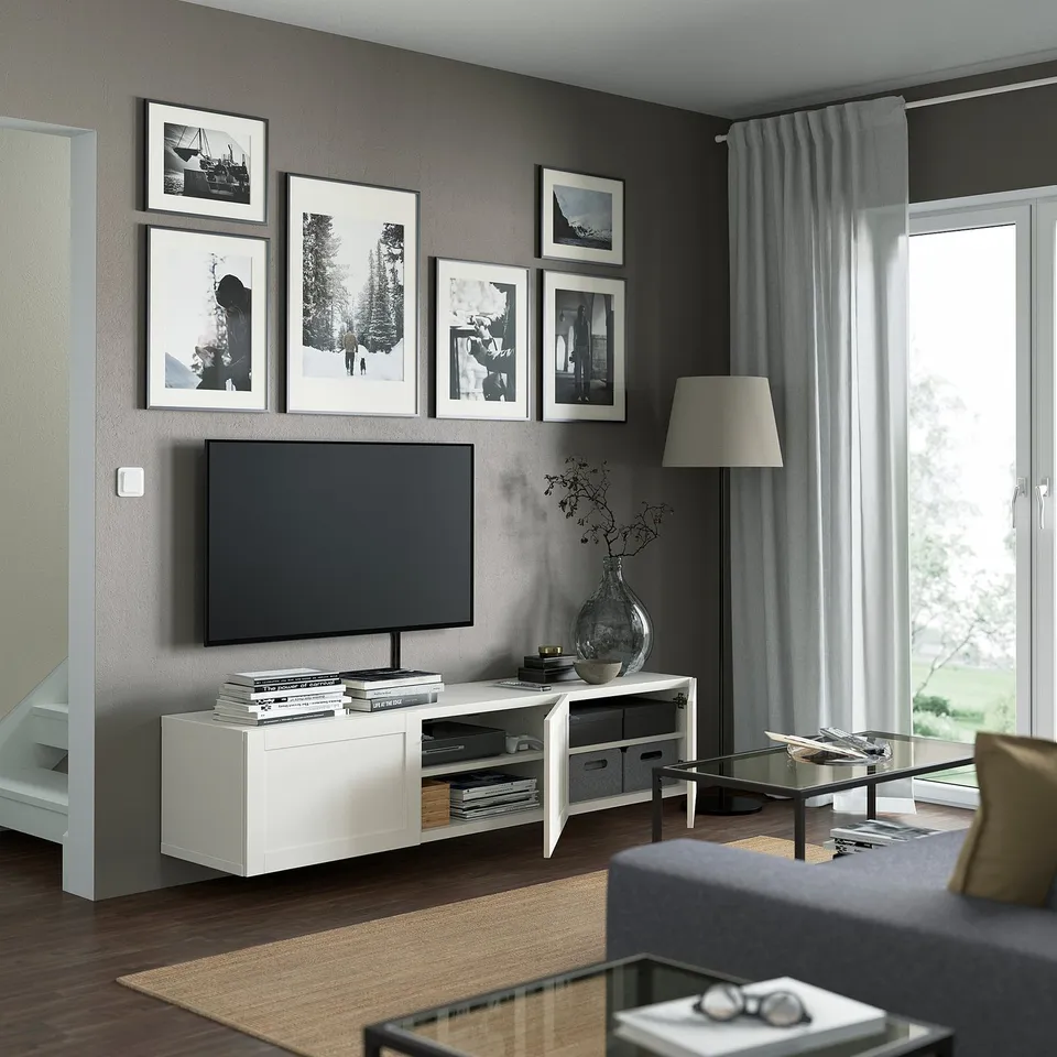 BESTÅ tv bench with storage, cables managed, adjustable shelves.