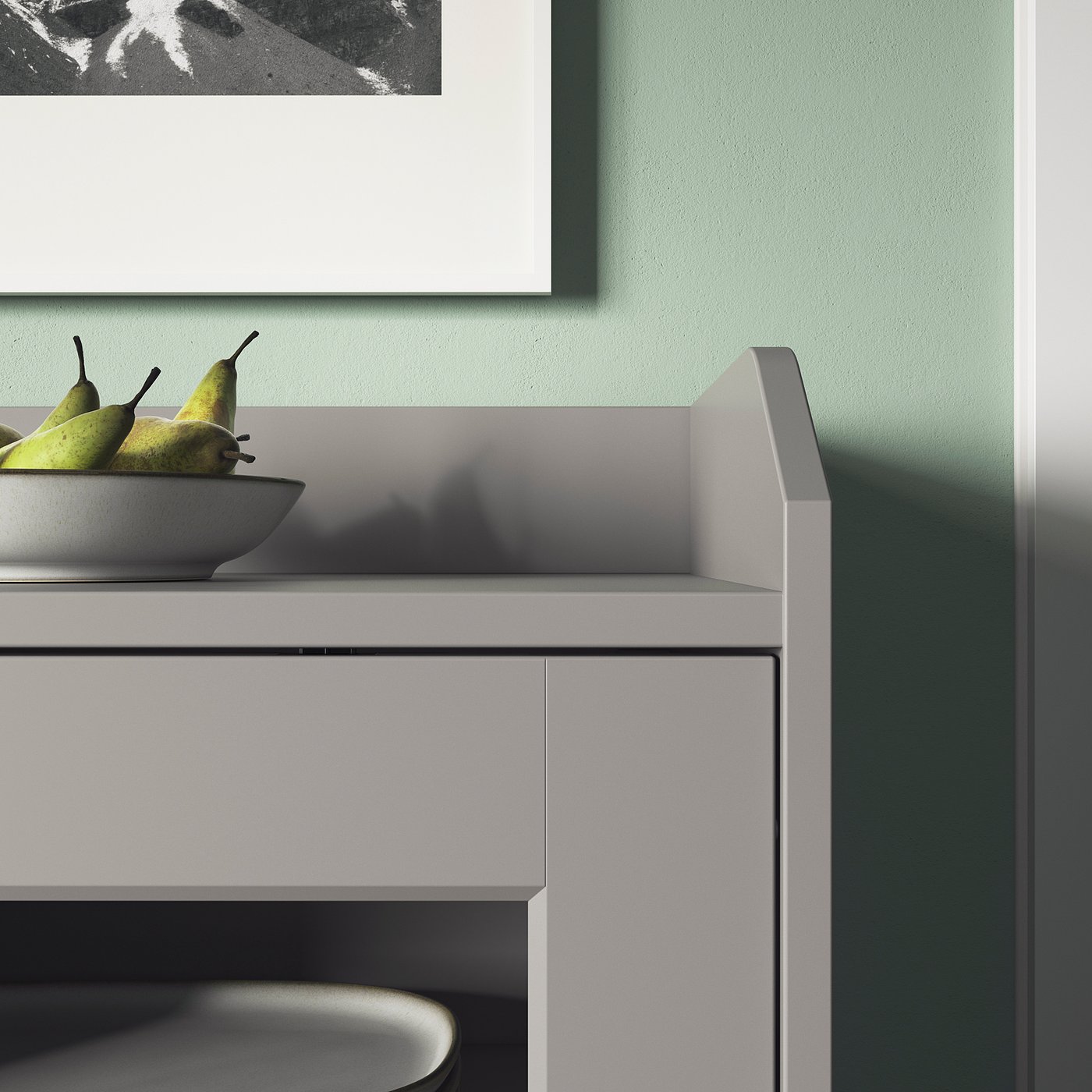 White cabinet with glass doors, displaying fruit in a bowl, set against a green wall. Modern, sleek design.