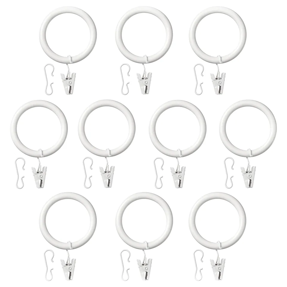 Image shows 12 white SYRLIG curtain rings with clips or hooks, arranged in rows.