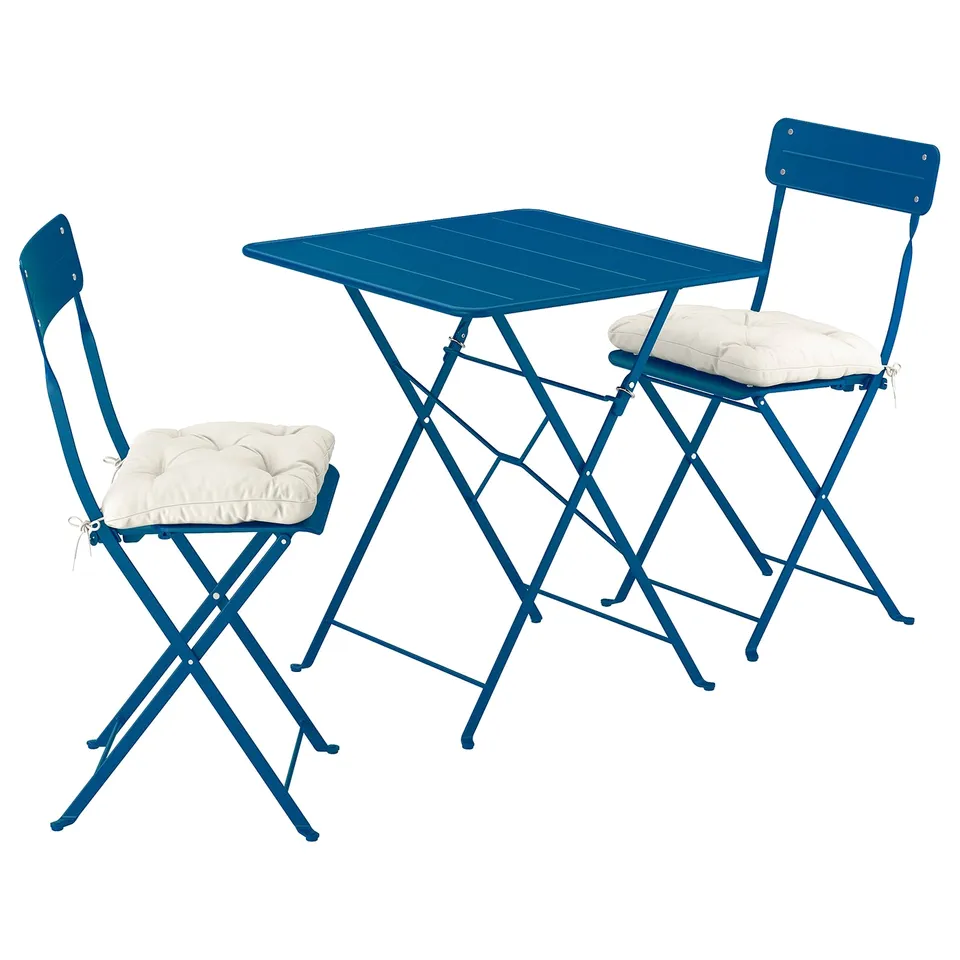 Blue foldable patio set, including table and two chairs with cushions, designed for small spaces.