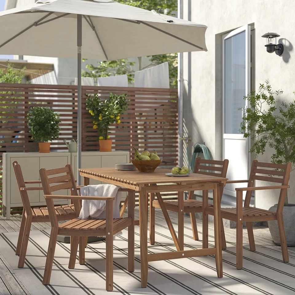 Acacia wood ASKHOLMEN outdoor dining set with table & chairs. Foldable, stackable, fits small spaces, with fruit bowl.