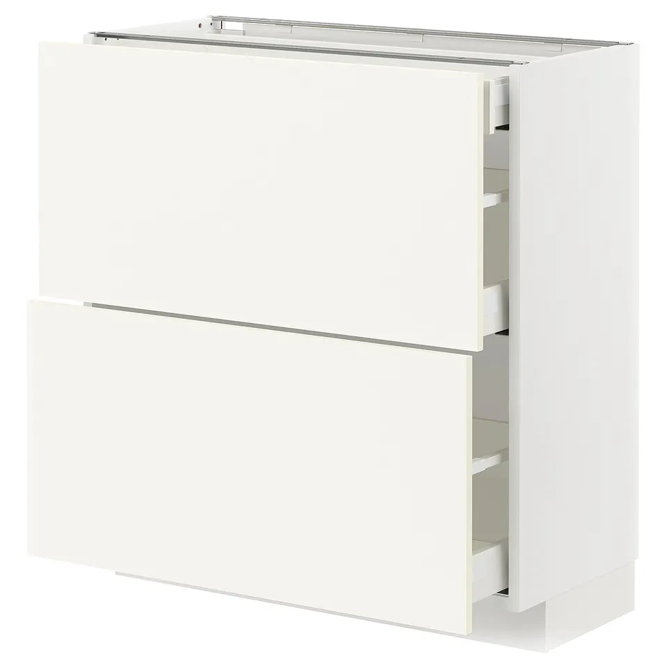 White METOD kitchen cabinet with vallstena fronts, including drawers and shelves.