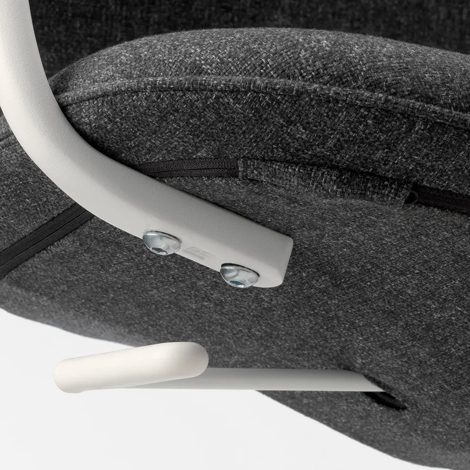 Close-up of adjustable office chair mechanism with metal screws and plastic components, showcasing durability.