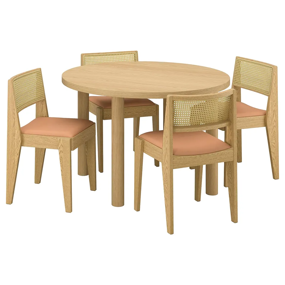 Round light wooden dining set with 4 chairs, featuring natural rattan backs and pink cushions, exuding a contemporary and elegant design.