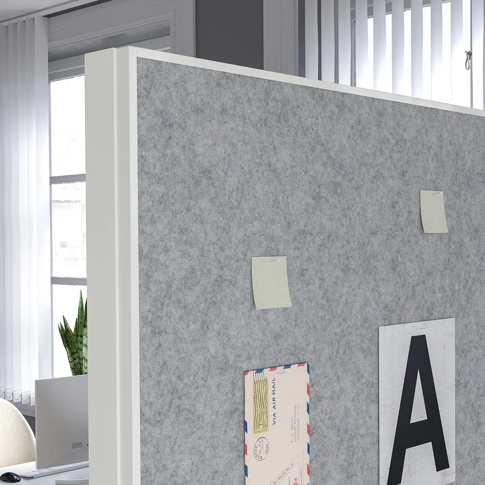 Double-sided noticeboard with sticky notes, leaning against a wall. Suitable for office use with a 10-year guarantee.