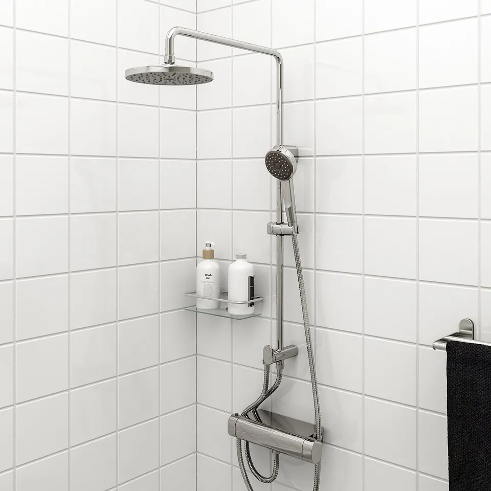 BROGRUND, chrome, shower head and rail combo. Modern, sleek design. Handheld and overhead showers. Fits well in tiled shower corner.