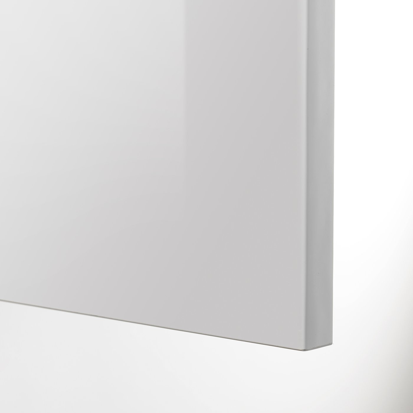 Modern kitchen cabinet with sleek, glossy grey finish. High-quality design, smooth surface, and sturdy build.