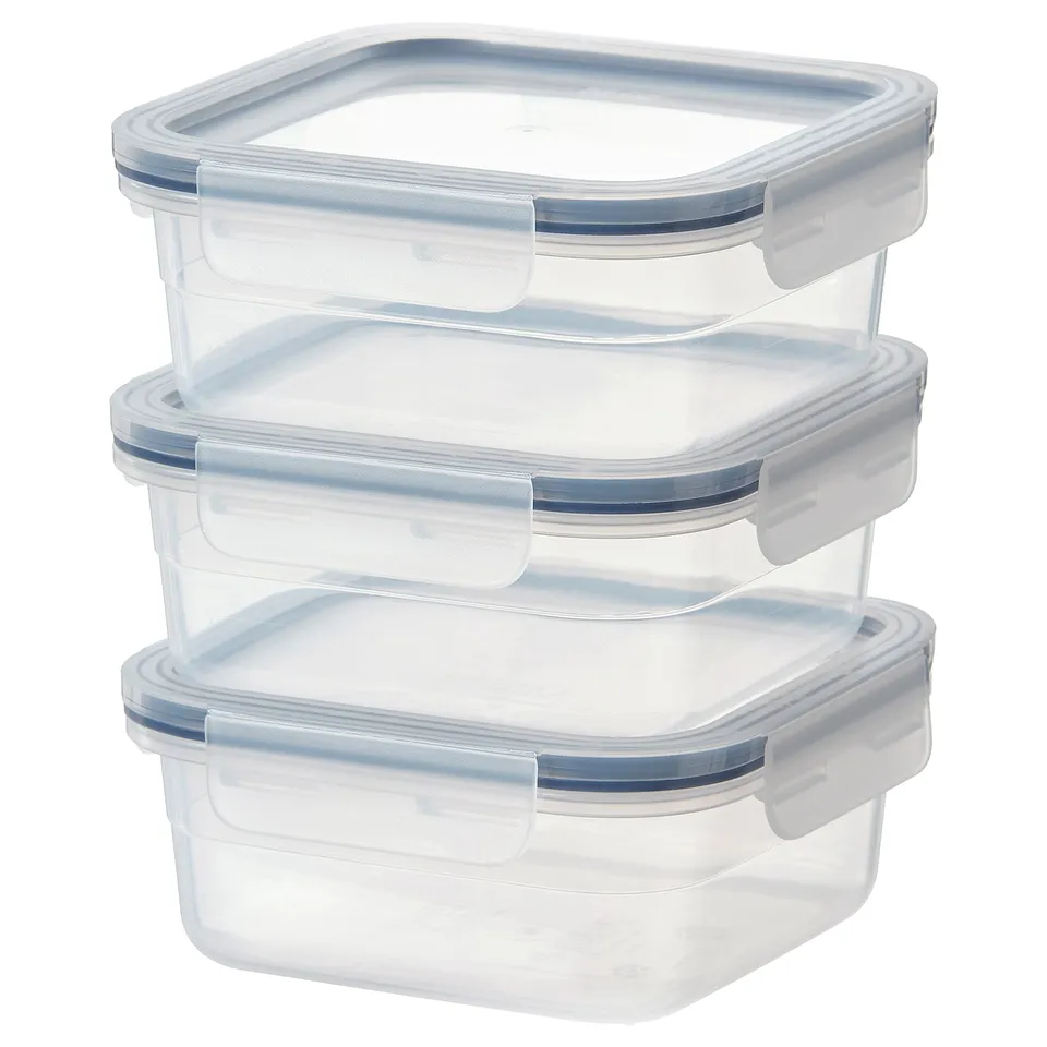 Three clear square IKEA 365+ plastic food containers stacked, with blue seals and snap-on lids.