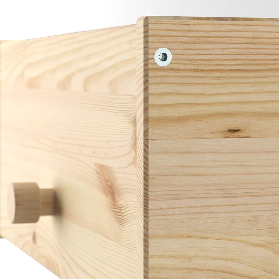 Close-up of RAGGBERG pine coat racks smooth, natural finish & quality wood grain.