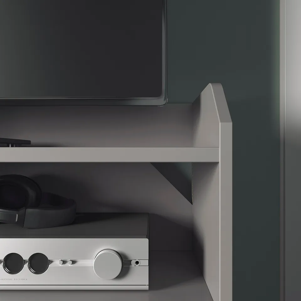 Modern tv stand with open shelves, displaying minimalist design. Quality materials, sleek finish, and clean lines.