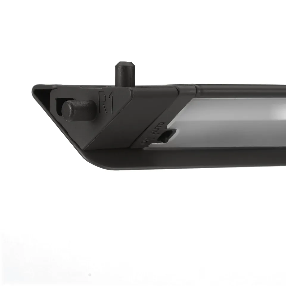 Close-up of sleek, modern led light fixture for wardrobes, showcasing robust design and precise engineering.