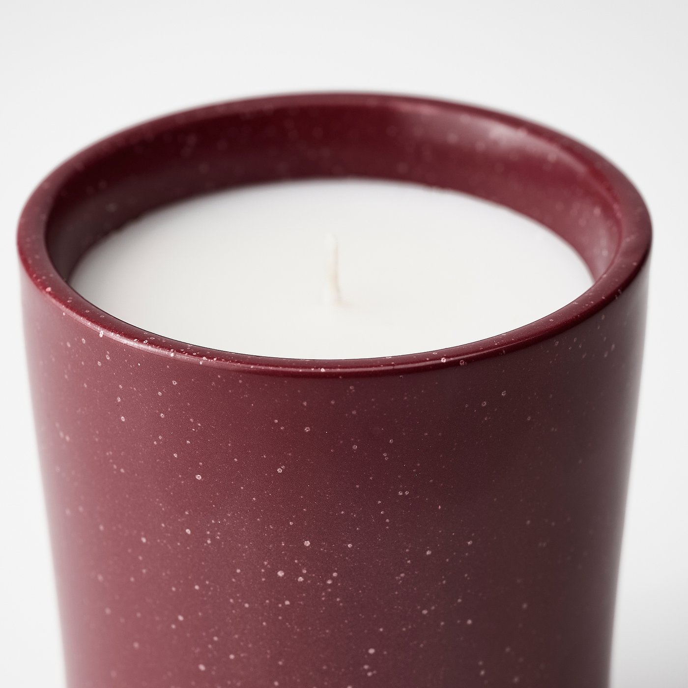 Maroon speckled candle