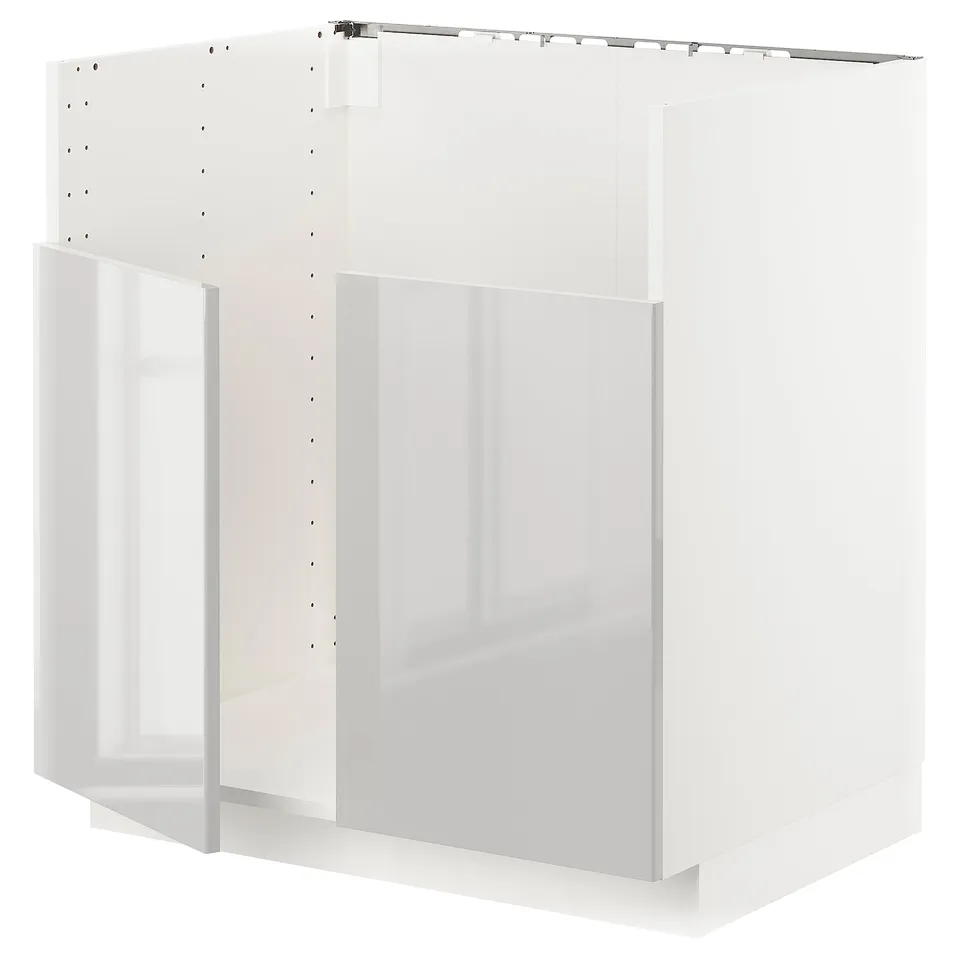 White METOD kitchen unit, glossy front, modern, rectangular shape, sturdy frame.