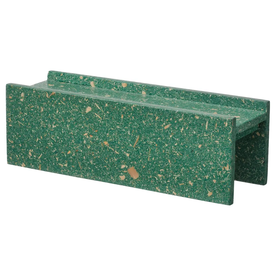 The HUNDHAJ green spice rack, speckled with bamboo, rectangular and designed to store jars and bottles efficiently.