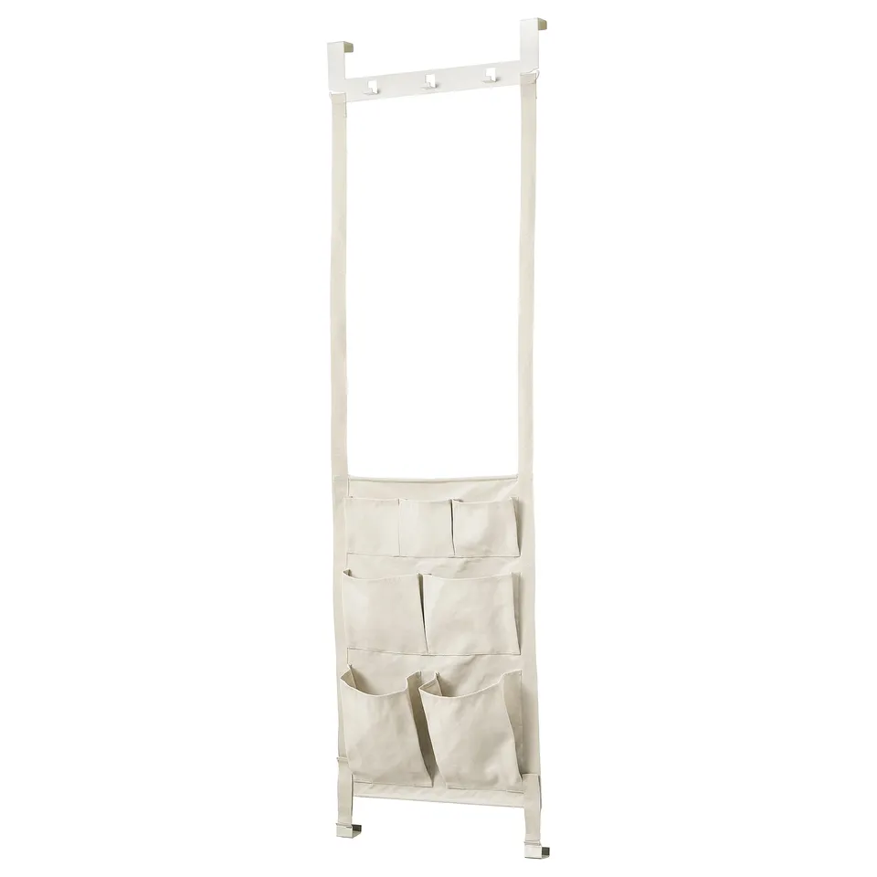 A kompishang hanging storage unit in white, designed for door use. It has a sturdy frame with multiple canvas pockets and hooks for organising items.