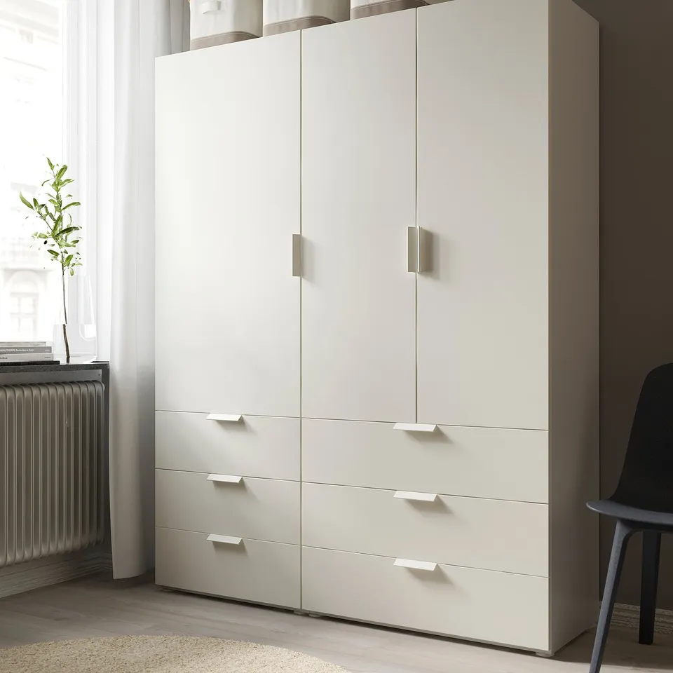 Modern white wardrobe with six drawers and two doors, featuring minimalist handles. Perfect for versatile, easy-assemble storage solutions.