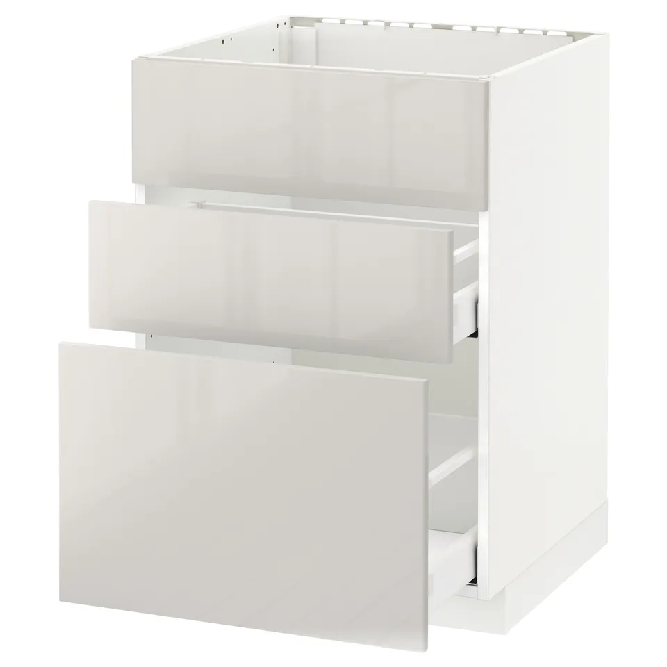 A white METOD kitchen cabinet with high gloss, featuring a pull-out drawer.