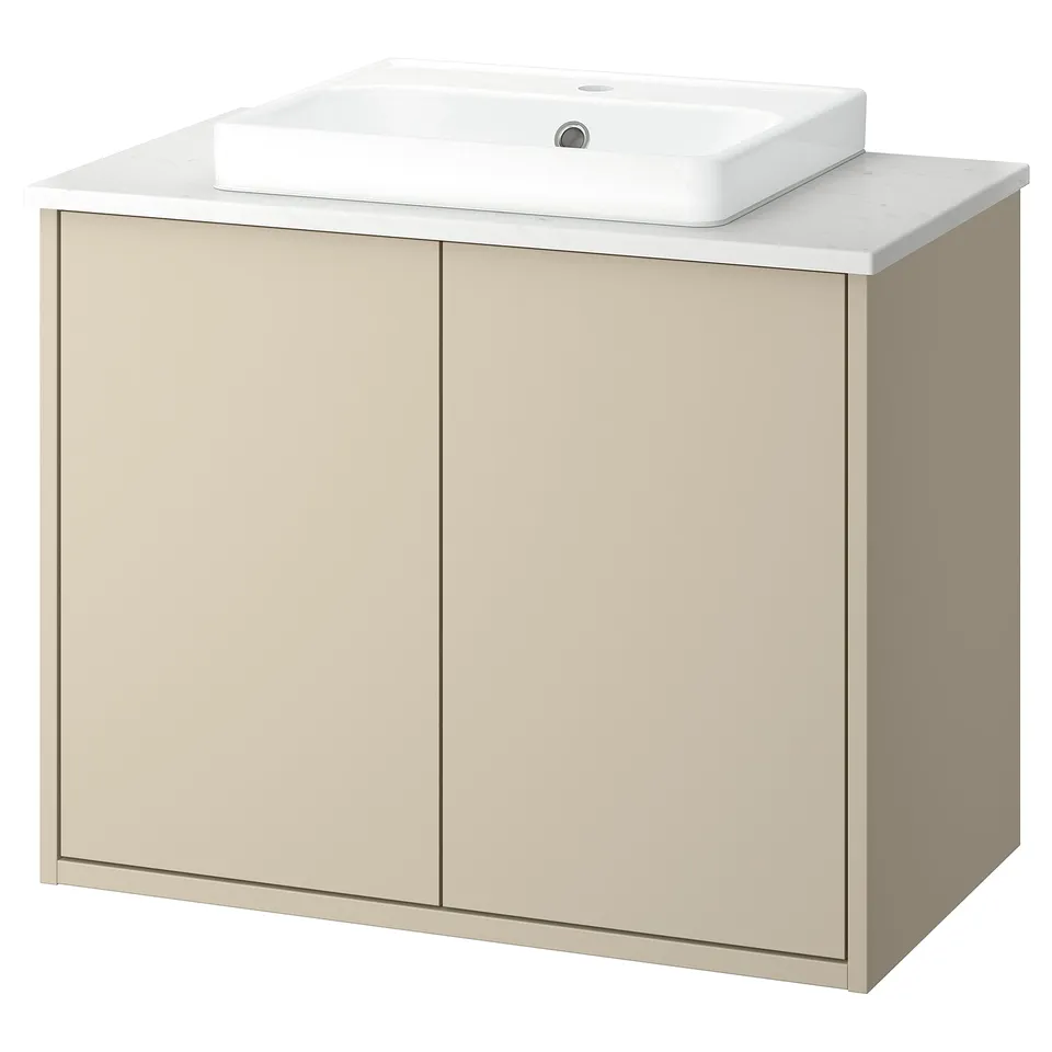 HAVBÄCK beige vanity unit with white counter and sink.