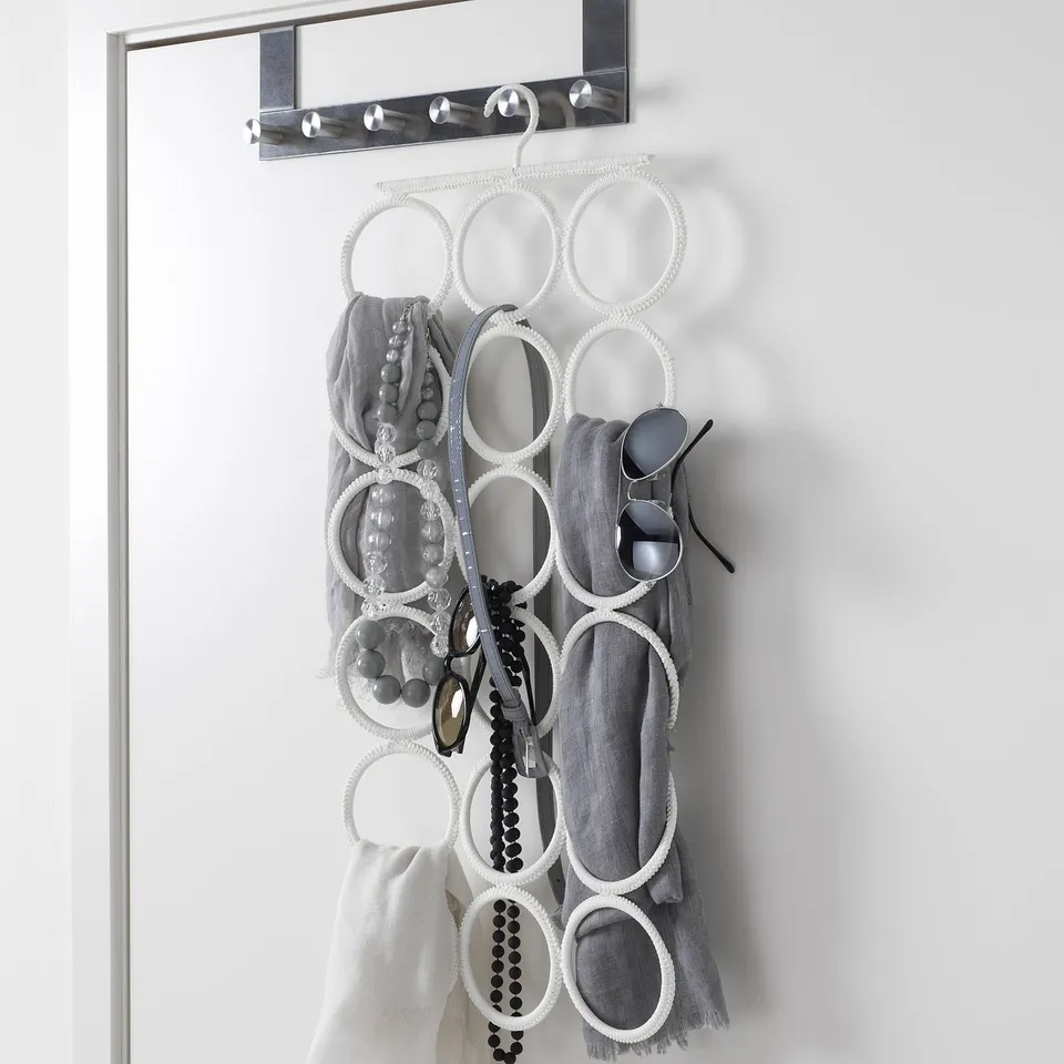 Accessory hanger holds 18 items, organised with loops, ideal for scarves, belts, and ties.