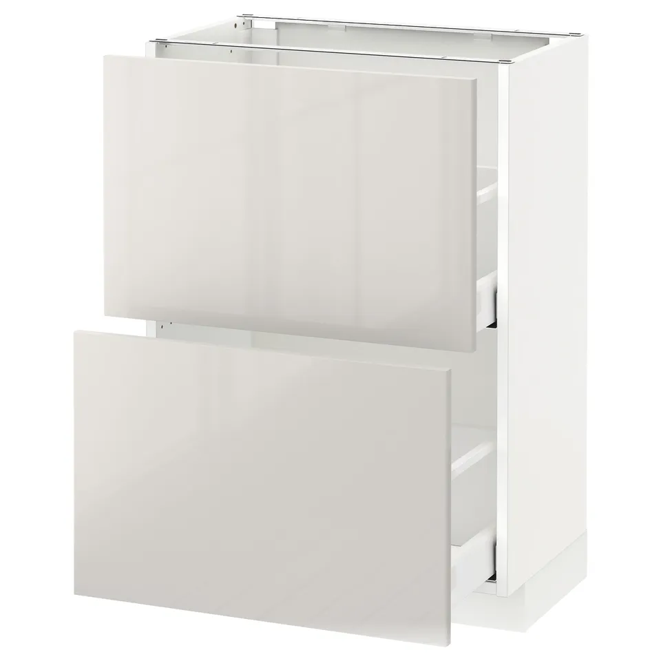 This image shows a white ikea METOD kitchen cabinet with high-gloss finish and integrated drawer, featuring modern design.