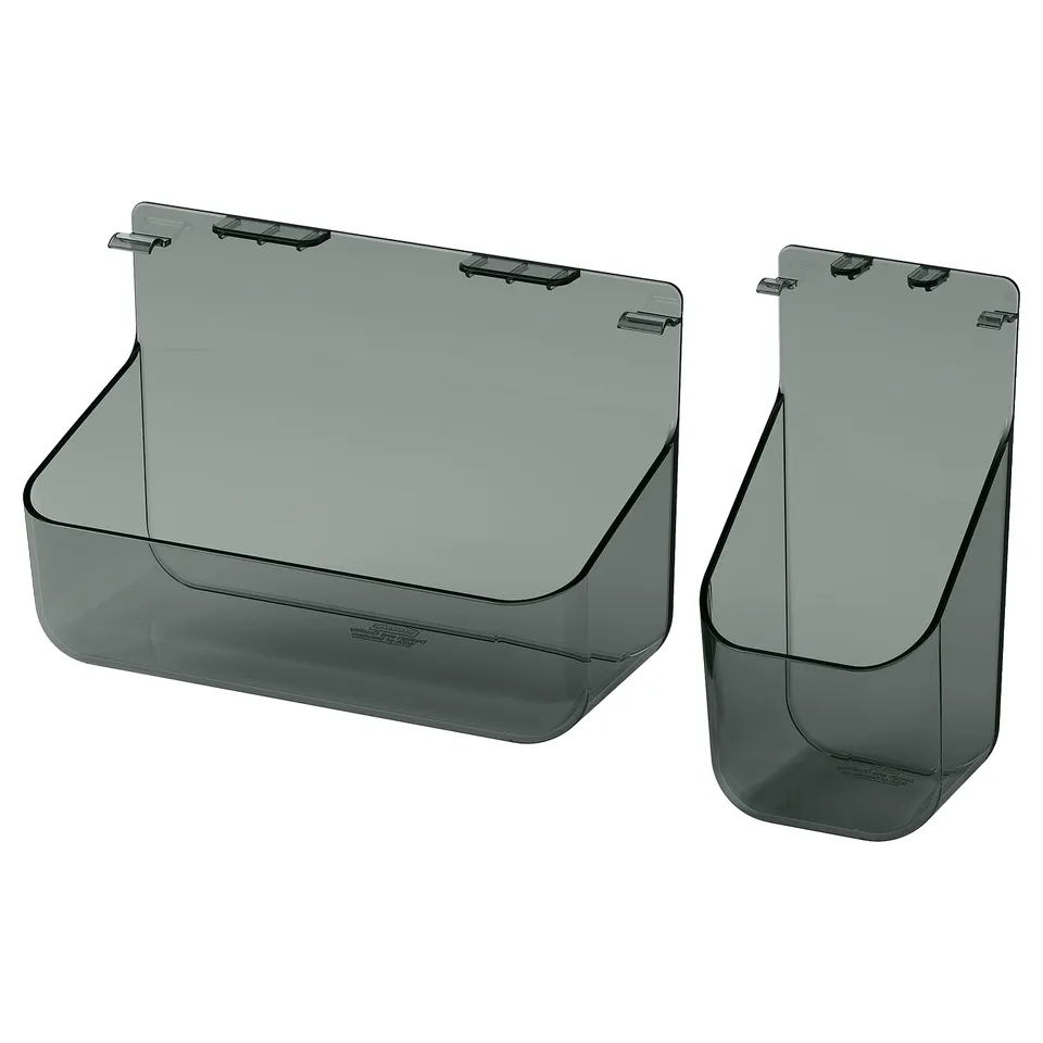 Two smoky grey plastic organisers hang vertically, designed for cabinet storage.